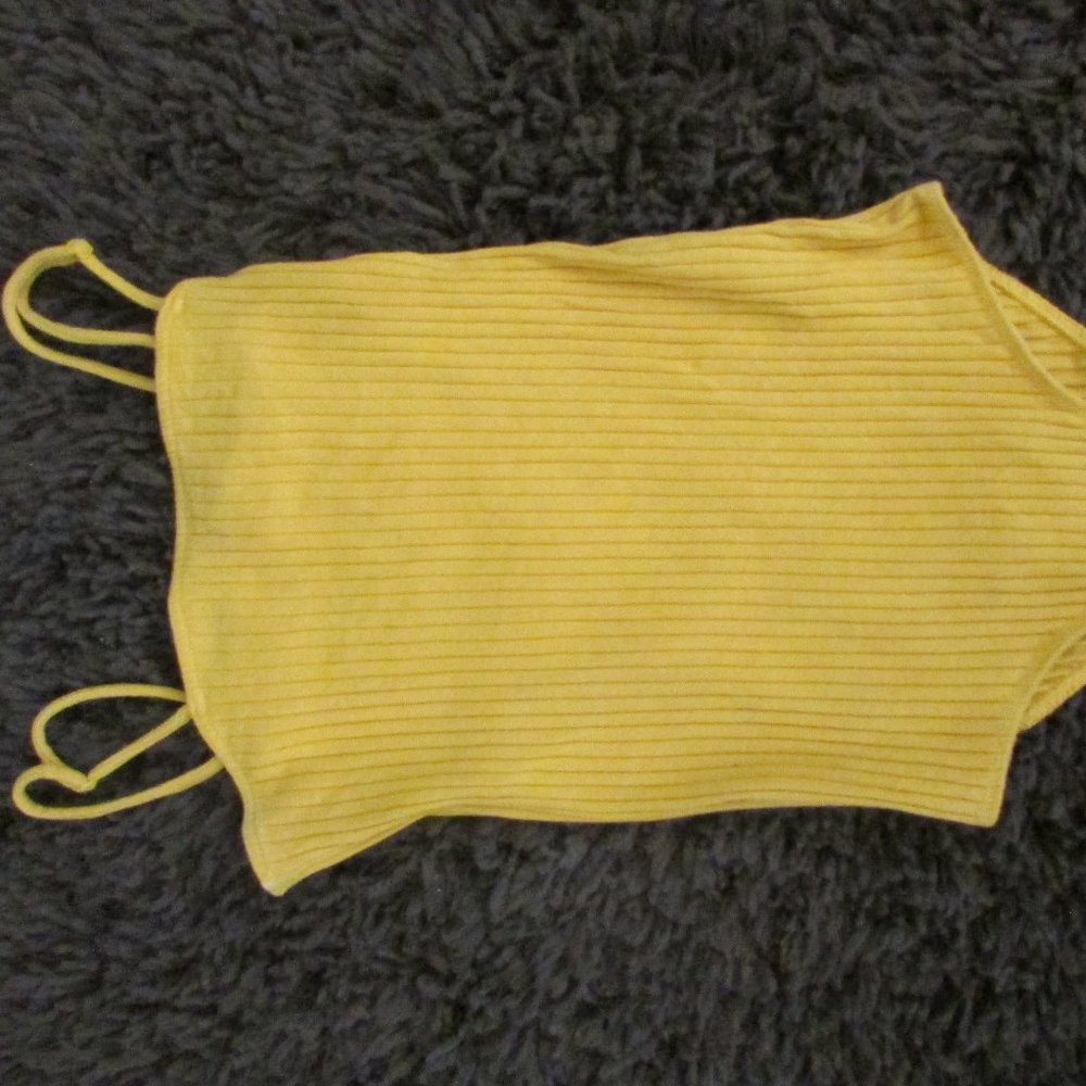 yellow bodysuit